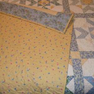 The back of the quilt is so cheery!