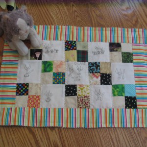 Meredith the Webkinz cat LOVES THE QUILT
