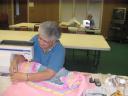 Claudette hard at work making charity quilts