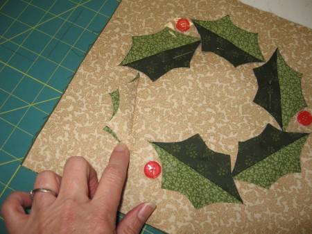 Cut and FOLD BAKC the DARK GREEN FABRIC part of the leaf