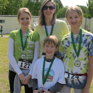 Christi (my dd) with her three Epplettes.....this was Christi's FIRST 5K ever! YEAH CE!
