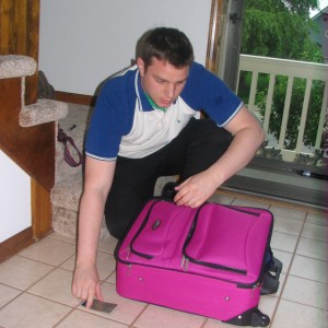 The future priest with his PINK SUITCASE