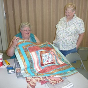 Kathryn and Patsy are admiring Kathryn's Round Robin