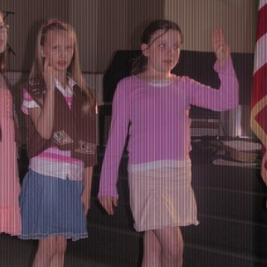 Sarah (in the Vest) saying the Brownie Pledge