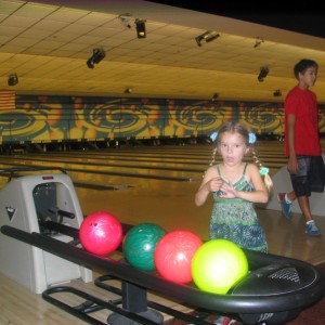 Jannae and her colorful bowling balls